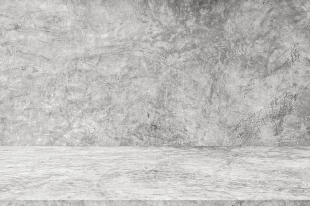 istock Wall empty studio interior background and backdrop of concrete cement wall in black and gray tones. Studio interior background and empty space Decorating ideas 2150244516