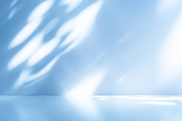istock Wall interior background, studio, and backdrops show products. with shadow from window color white and blue light. background for text insertion and presentation of product 2150244542
