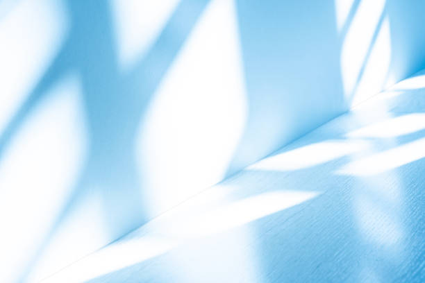 istock Wall interior background, studio, and backdrops show products. with shadow from window color white and blue light. background for text insertion and presentation of product 2150244550