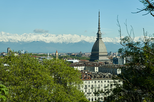 View of the city of Turin surrounded by snow-capped mountains, taken from Monte dei Capuccini