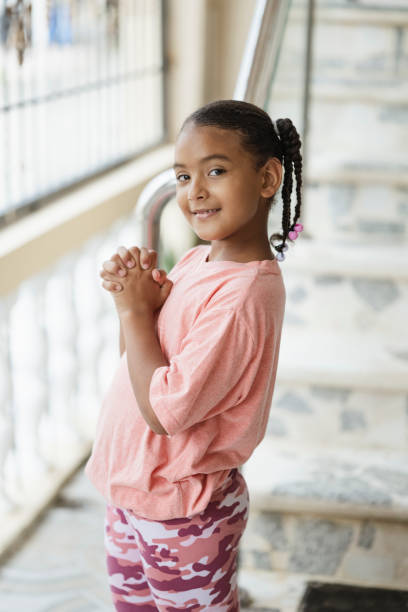 istock Little girl smiling looking at the camera 2150248016