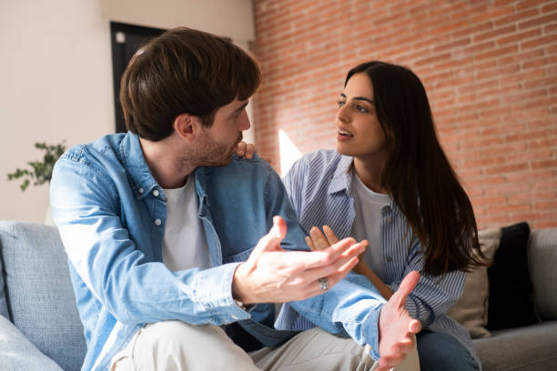 istock Close-up of unhappy young couple sitting apart have relationship problems, think about breakup or divorce. Family lovers, distraught men and women, avoid talking and suffer from betrayal in relationship problems. 2150250020