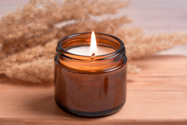 istock Scented burning candle with pampas grass 2150251808
