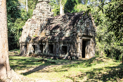 Ancient Khmer Hindu temple ruins in the jungle