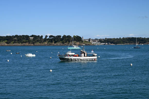 Dinard, France, april 18, 2024 : Corsaire shipping company boat crossing between Saint-Malo and Dinard