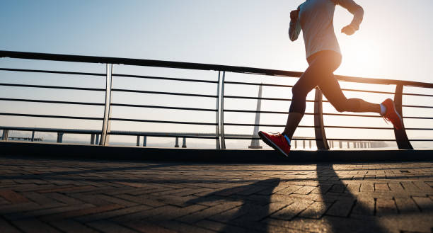 istock Fitness woman runner running at seaside 2150255933