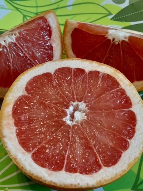 istock Slices of grapefruit on plate 2150255968
