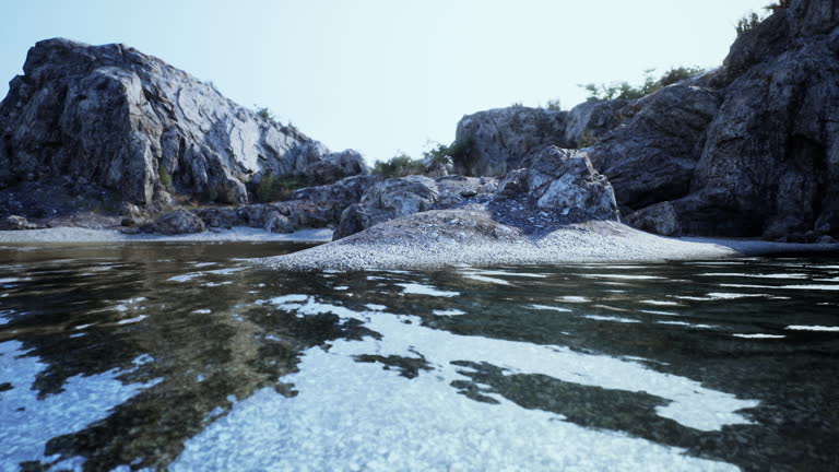 Group of Rocks on Water, Rocky Cliff, Spain
