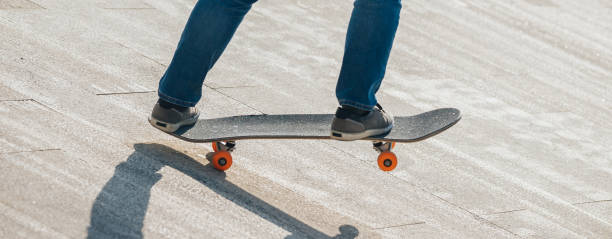 istock Skateboarder skateboarding outdoors in city 2150257553