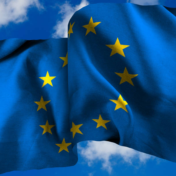 istock waving European Union flag against a blue sky 2150258277