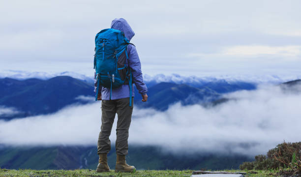 istock Successful hiker enjoy the view on mountain top 2150258706