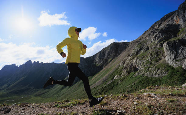 istock Woman ultramarathon runner running at mountain top 2150260880