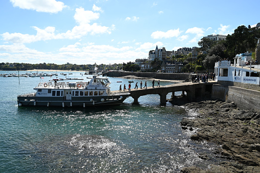 Dinard, France, april 18, 2024 : Corsaire shipping company boat disembarking its passengers on the quay of Dinard