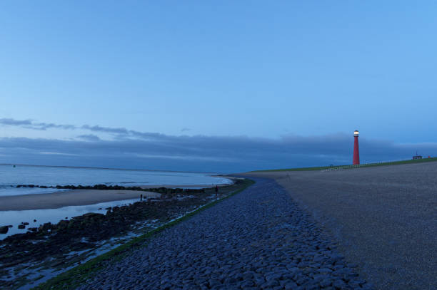 Lighthouse at night, North Holland.