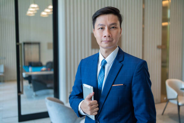 istock Confident Businessman with Tablet in Modern Office 2150262777