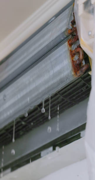istock cleaner washing air conditioner 2150270859