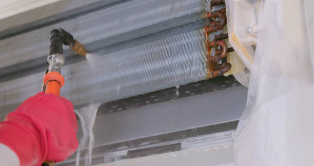 istock cleaner washing air conditioner 2150270945