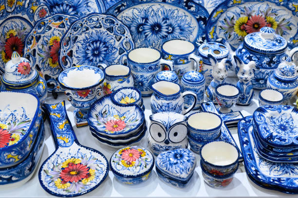 Lisbon, Portugal - March 12, 2024: Traditional souvenir objects in a small business retail display in the market. The city is known for the quality of its ceramics