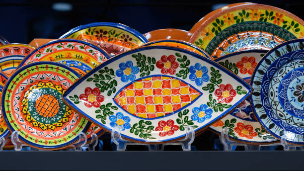 Lisbon, Portugal - March 12, 2024: Traditional souvenir objects in a small business retail display in the market. The city is known for the quality of its ceramics
