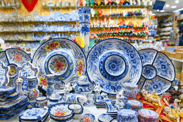 Lisbon, Portugal - March 12, 2024: Traditional souvenir objects in a small business retail display in the market. The city is known for the quality of its ceramics