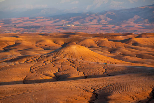 Sunset in the Agafay Desert just outside Marrakech town in Morocco. Africa, popular atttractttion for tourist