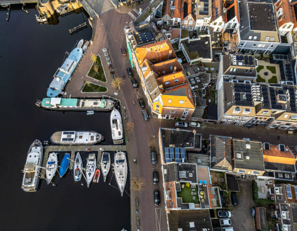 Aerial view of Leiden town, harbour from above, typical Dutch city skyline with canals and houses, Holland, Netherlands
