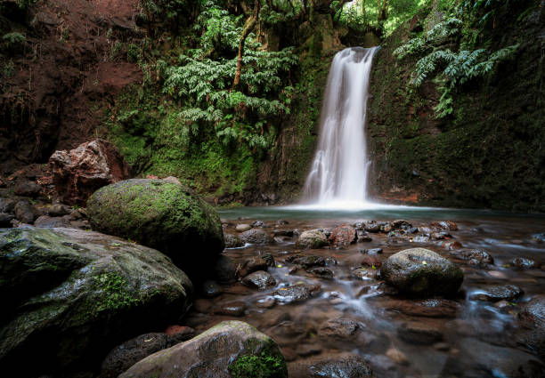 istock Beautiful waterfall hidden in the Azores islands forest 2150272245