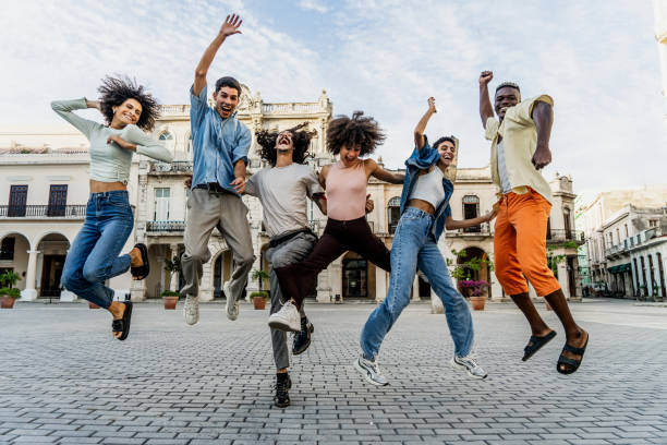 istock Friends jumping on the street 2150272296