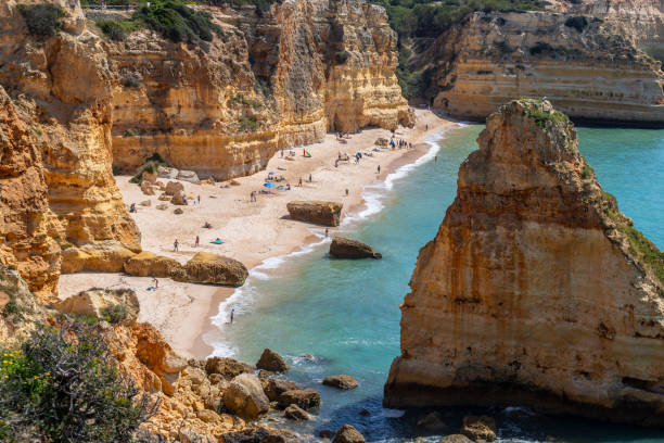 istock Viewpoint of Marinha Beach and its cliffs 2150273840