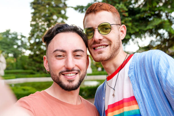 istock Capturing Joy: LGBT Couple's Vibrant Park Selfie Moment 2150274976