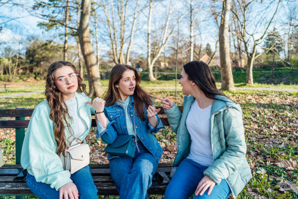 istock Female friends arguing in the park 2150278639
