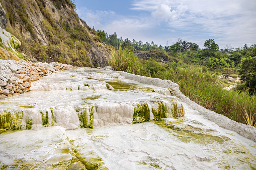 Volcanic geothermal landscape which consists of chalk, sulfur and algae at thermal springs in volcanic surroundings. The picture is taken at the Sipoholon hot springs in the northern part of Sumatra
