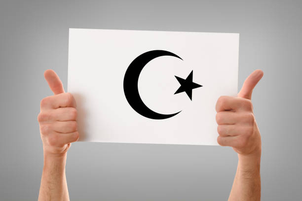 istock Hands okay holding a poster with islamic symbol gray isolated 2150279500