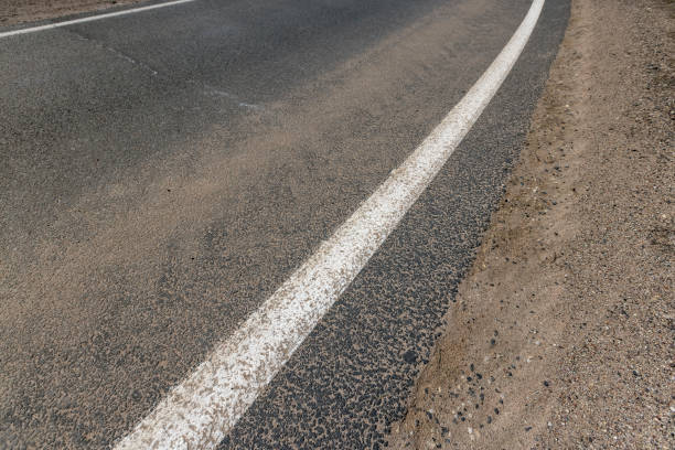 istock details of a highway with a white painted line 2150281028