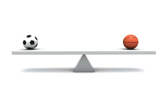 balance between a Soccer Ball and a Basketball