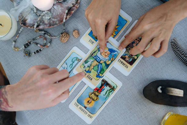 istock A bald woman reading tarot 2150284190