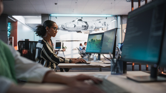 Black Female Game Developer Using Desktop Computer With 3d Modelling ...