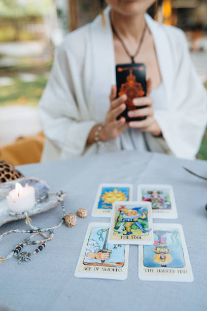 istock A bald woman reading tarot 2150284992