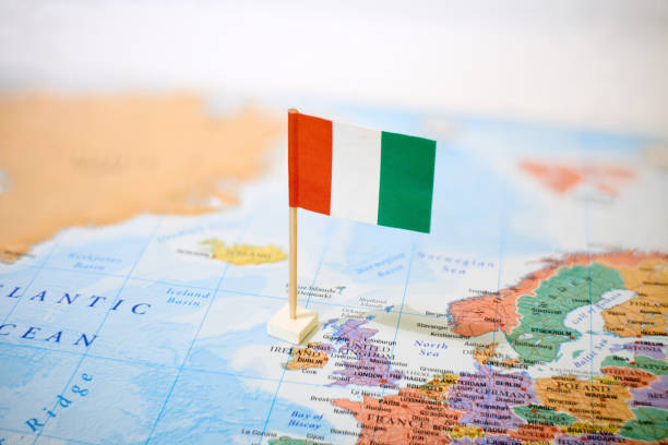 Round red thumb tack pinched through city of Dublin on Ireland map. Part of collection covering all major capitals of Europe.