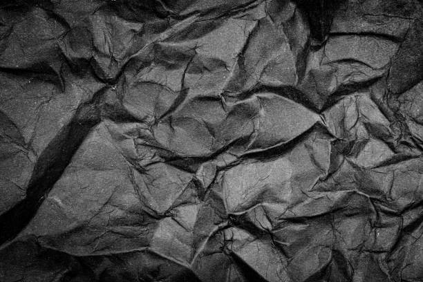 istock Black Paper Texture background. Crumpled Black paper abstract shape background. 2150288863