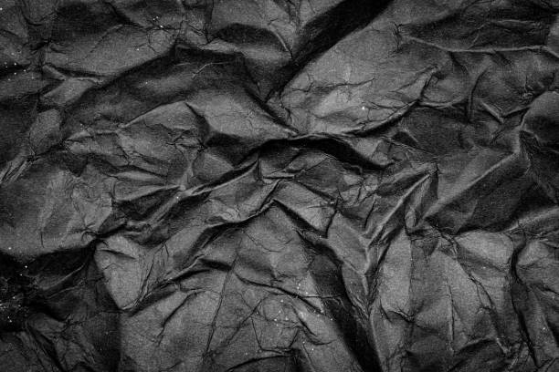 istock Black Paper Texture background. Crumpled Black paper abstract shape background. 2150288867