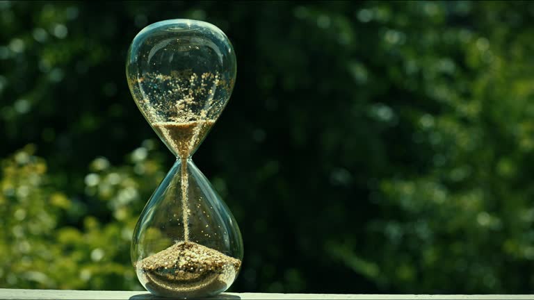 Hourglass - about the passage of time - concept.
