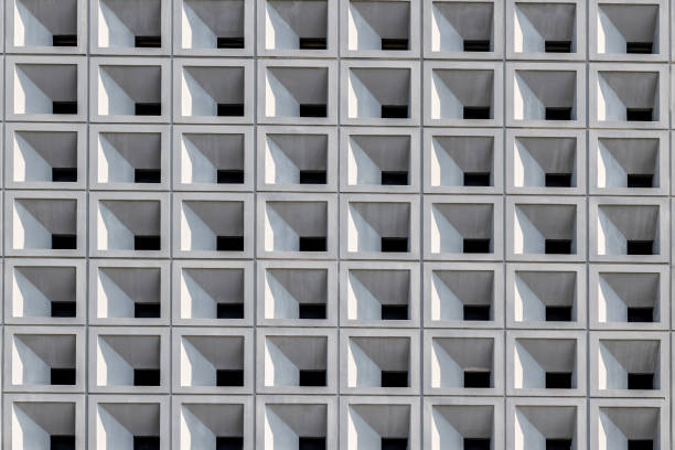 istock Conrete architecture wall detail. Close up big stone walls 2150290274