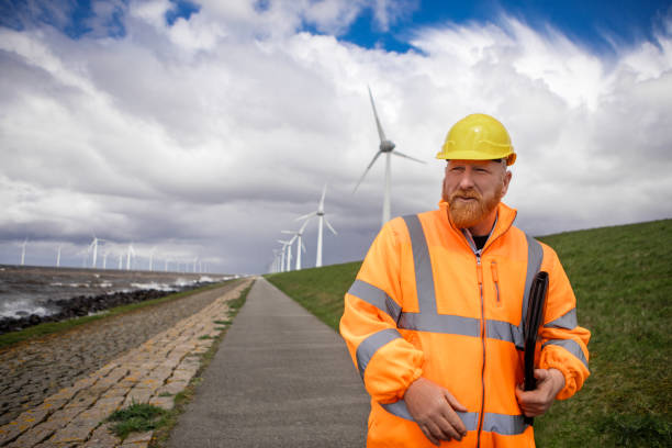 istock A dutch Windmill turbine engineer on a sea front power site 2150290762