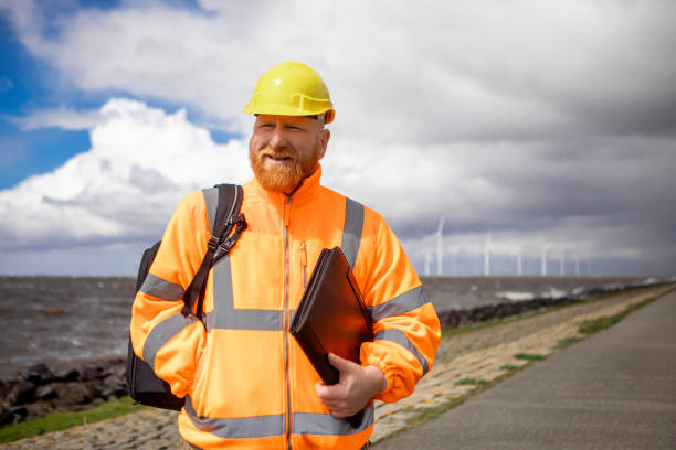 istock A dutch Windmill turbine engineer on a sea front power site 2150290779