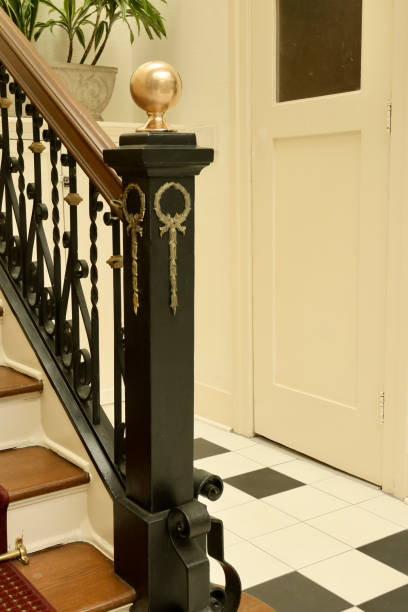 istock Elegant formal staircase with wrought iron detailing 2150292436