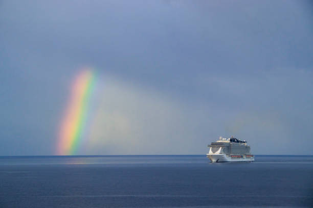 Grand Cruise Ship Front View – Majestic Ocean Liner on Open Water with Blue Sky and Sunlight Reflections