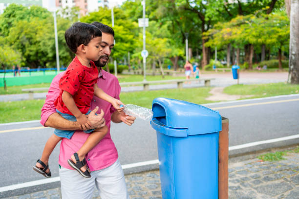 istock Father and son in public park 2150296846