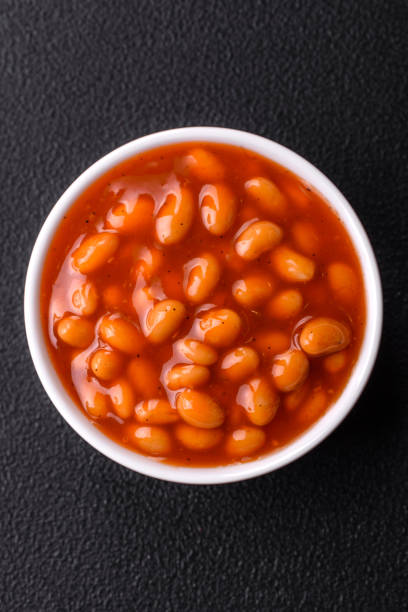 istock Delicious nutritious canned beans in tomato, with salt and spices 2150297470
