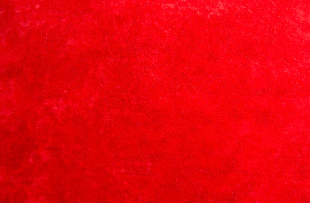 istock Background from a red perfect suede fabric. Velvet texture. 2150299577